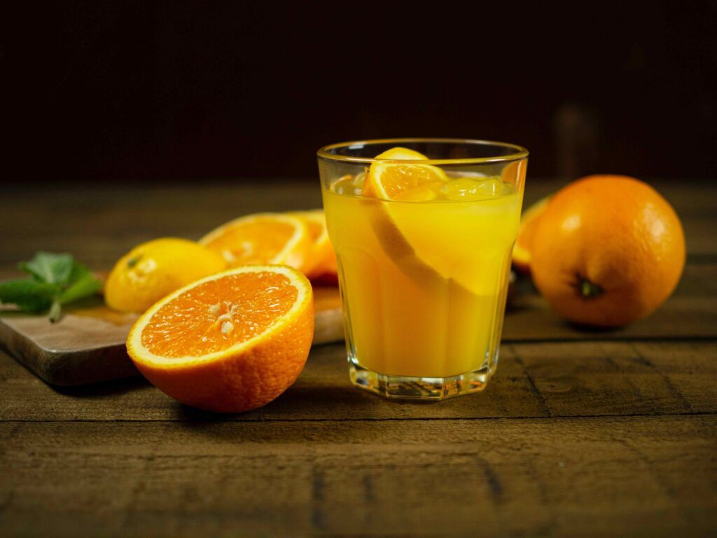 A glass of Orange mint juice