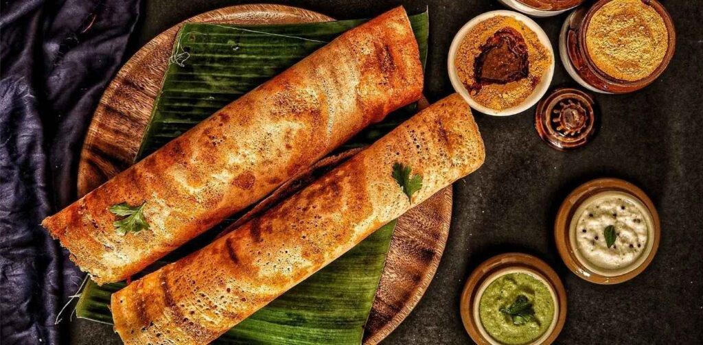 A delicious plate with only dosa and chutneys