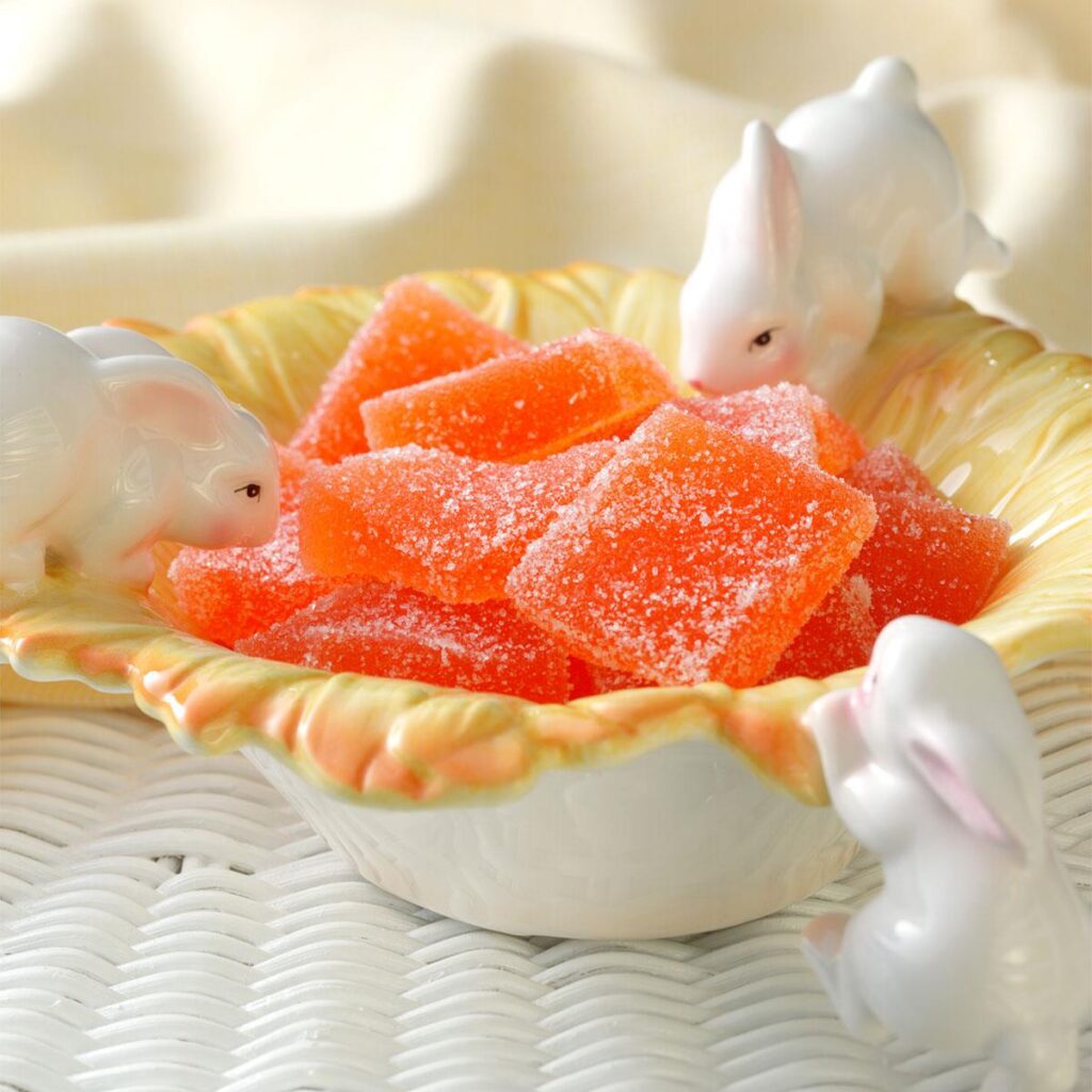 A bowl full of healthy orange candy