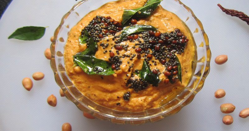 A bowl of tomato peanut chutney