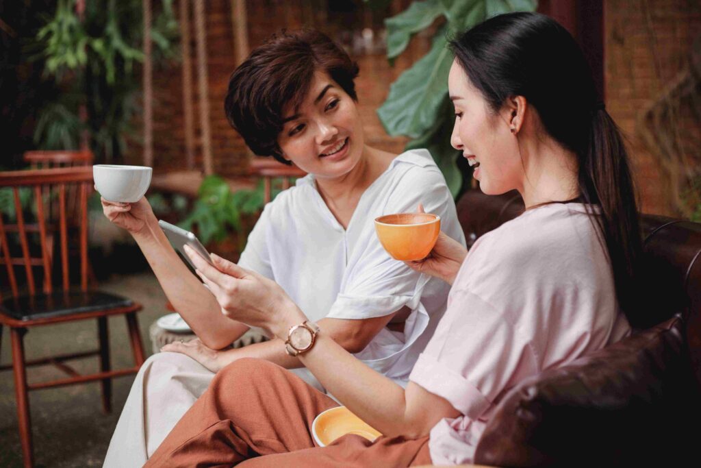 Two women sitting and enjoying coffee